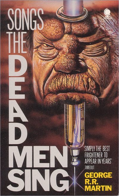 <i>Songs the Dead Men Sing</i>,<br />Sphere Paperback <br />1986 (UK) 